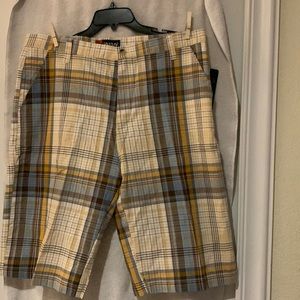 Mens shorts. New w tags. Size 38. Shades of cream,tan gold and blue.